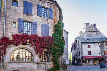the main square of the small medieval town of Besse en Chandesse in Auvergne, France