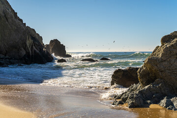 Fototapeta na wymiar Beautiful beach with ocean view and stones, Half Moon Bay, California 