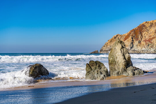 Beautiful beach with ocean view and stones, Half Moon Bay, California	