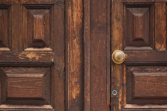 View Of An Old Wooden Door With A Knob