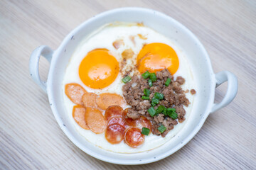 Kai Kata - fried egg in pan with topping