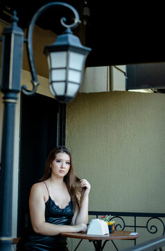 
Girl sitting in a coffee