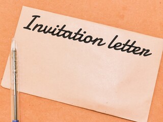 Text INVITATION LETTER written on brown envelope.Business concept.