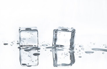 Melting Ice Cubes with reflections on a white background