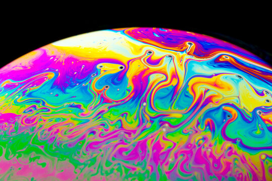 Macro of the rainbow patterns on soap bubbles