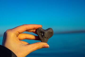 hand of the person with a rock 