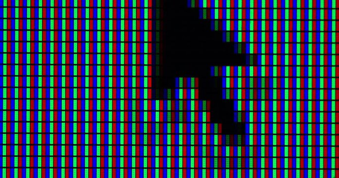 Extreme close up of computer monitor RGB pixels and moving cursor on it. Shot on RED camera.