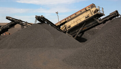 Piles of manganese ore rock created by huge special machines in South Africa