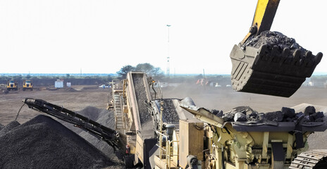 Manganese mining open pit with many large trucks for ore transporting in South Africa