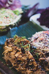 Hawaiian food table - pulled pork, slaw