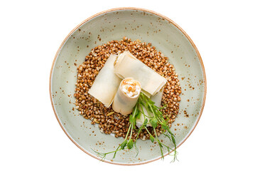 Steamed buckwheat and tender pancakes. Restaurant service concept. Isolated.
