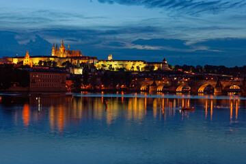 Evening view of Prague Castle and Charles Bridge over Vltava river from Novotneho Lavka, Prague, Czech