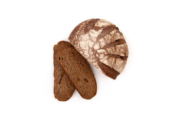 Rye bread round loaf cut into pieces on a white background.