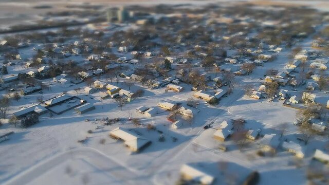 Tilt Shift Aerial of Snowy Rural Small Town