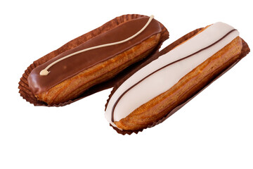 Two fresh custard eclairs with chocolate and vanilla glaze, isolated on white background.