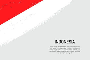 Grunge styled brush stroke background with flag of Indonesia
