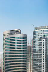 Fototapeta na wymiar Vertical photo of modern office buildings in the financial district