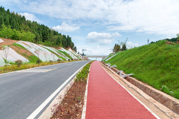 Fototapeta na wymiar new asphalt road in the country