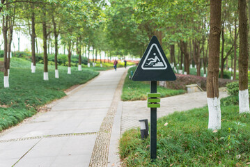 Pay attention to step sign in the park
