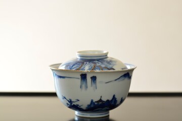 picture rice bowl. put on a Japanese lacquer shelf. This is a very fine example of Japanese traditional antique “ imari ware ”. blurred background soft focus image.