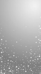 Random falling stars Christmas background. Subtle flying snow flakes and stars on grey background. Alluring winter silver snowflake overlay template. Great vertical illustration.