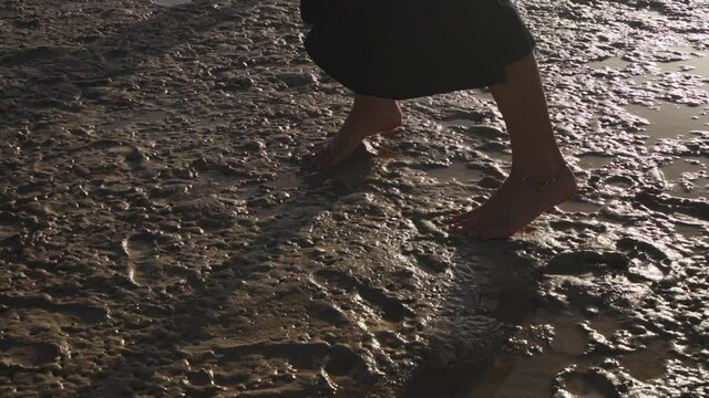 Close Up Of Female Feet Dancing In Mud Slow Motion