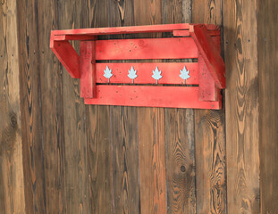 vintage red wooden hanger on wooden wall