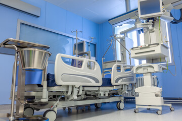 Hospital bed in intensive care with life saving equipment