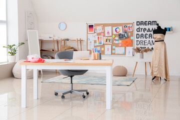 Stylish interior of fashion designer workplace