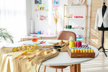 Stylish interior of fashion designer workplace