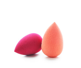 Makeup sponges on white background