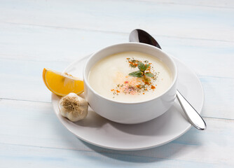 Traditional Turkish tripe soup. The concept of Turkish cuisine traditional soups