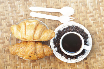 cup of coffee and croissant
