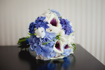 Tender Bride's bouquet in blue and white colors
