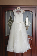Bride's wedding dress is ready and waiting for the Bride and wedding ceremony in a Bride's room