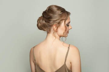 Beautiful female profile and back. Wedding hairstyle on white background