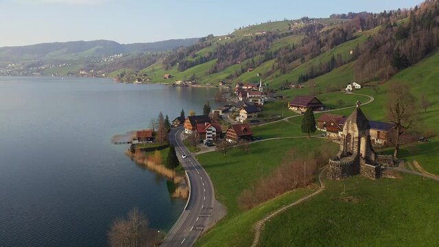 Aerial footage of the Morgarten village and the memorial monument of the famous battle of 1315 by lake Aegeri in Canton Zug in Switzerland. 