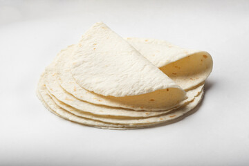 Tortilla cake, pita, on a dark white background for insulation