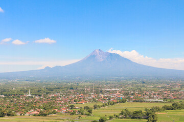 Aerial view of Mount Merapi Landscape with rice field and village in Yogyakarta, Indonesia Volcano Landscape View