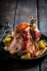 Closeup of grilled pheasant with bacon and vegetables