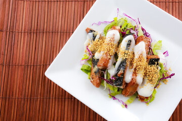 vegetable salad with lemon sauce and sesame