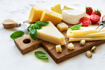 Various types of cheese and snacks