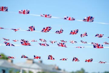 British Union Jack bunting flags against 