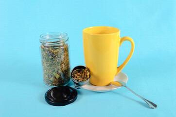Cup of tea on a saucer with ingredients