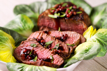 Sliced Beef Tenderloin with Pink Pepper. High quality photo.