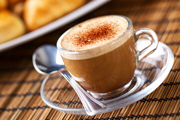 Typical Italian espresso with milk. High quality photo.