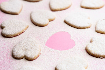 Fototapeta na wymiar Happy valentines day 2021. Bakery. Heart shaped cookies on pink background