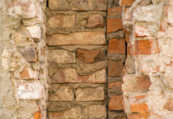 Old red brick wall close up shot with selective focus from blur.