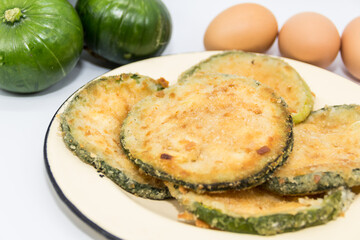 Trunk zucchini in baked or fried milanesas, Argentine cuisine