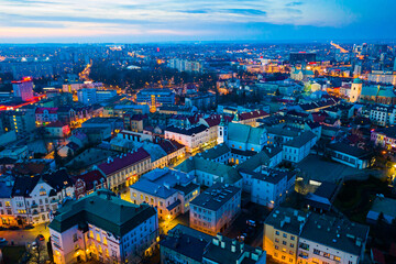 View from drone of lighted Rzeszow cityscape at spring twilight, Poland..